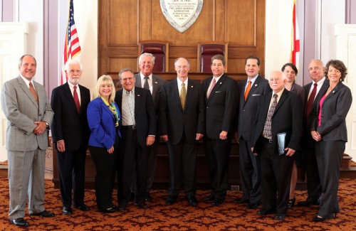 Alabama Gov. Robert Bentley, along with Chris Masingill, Federal Co-Chairman, Delta Regional Authority (DRA), and Jim Byard, Director, Alabama Department of Economic and Community Affairs, pose for a photo with the recipients of nine projects receiving grants totaling $10.4 million from the DRA and other public and private investments at a ceremony at the state Capitol in Montgomery, Thursday, Sept. 17, 2015. (Governor's Office, Jamie Martin)