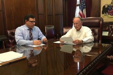 Alabama Governor Robert Bentley recieves his regular briefing from Alabama Law Enforcement Agency Secretary Spencer Collier and other top officials. The discussion included an update on the vetting process for refugees coming to the United States. Friday, November 20, 2015. (Governor's Office, Daniel Sparkman)