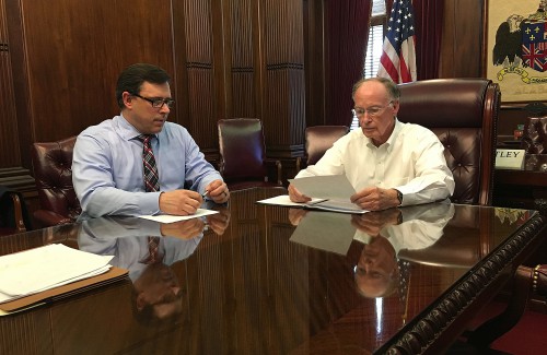 Alabama Governor Robert Bentley recieves his regular briefing from Alabama Law Enforcement Agency Secretary Spencer Collier and other top officials. The discussion included an update on the vetting process for refugees coming to the United States. Friday, November 20, 2015. (Governor's Office, Daniel Sparkman)