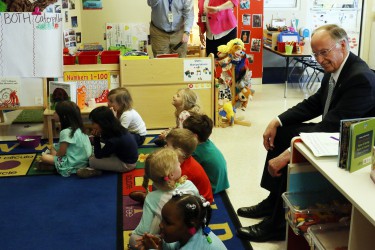 Governor Robert Bentley enjoys a few moments with students at Madison City Schools First Class Pre-Kindergarten Center in Harvest, Ala., Monday, April 4, 2016. Gov. Bentley has proposed an increase in funding of Pre-K by $20 million in the Education Trust Fund to the Legislature. (Governor's Office, Jamie Martin)