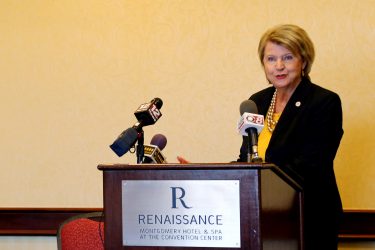 Alabama Department of Human Resources Commissioner Nancy Buckner introduces Alabama Gov. Robert Bentley at a meeting of child welfare leaders from 20 rural states in Montgomery, Friday, Sept. 4, 2015. The Alabama Department of Human Resources and the Casey Family Programs hosted the meeting. (Governor's Office, Jamie Martin)