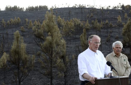 Alabama Gov. Robert Bentley appeals to citizens about the serious drought situation in the state after touring the site of a recent wildfire in Walker County, near Dora, Ala.,  Thursday, Oct. 27, 2016. He joined Interim State Forester Gary Cole and Assistant State Forester Dan Jackson in urging residents to obey the Drought Emergency Declaration, often called a "No Burn Order," that he signed earlier this month. Since October 1, 2016, 987 wildfires have destroyed more than 10,730 acres in Alabama, more than four times the amount that occurred during the same time period in 2015. (Governor's Office, Jamie Martin)