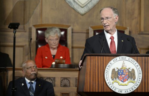 Alabama Gov. Robert Bentley delivers his annual State of the State address to a joint session of the Alabama Legislature Tuesday, Feb 7, 2017, in the Old House Chamber of the Historic Alabama State Capitol in Montgomery. Behind Gov. Bentley are members of the escort committee, including Sen. Clay Scofield, Sen. Rodger Smitherman, Rep. Adline Clarke, Rep. Teri Collins and Rep. Jim Patterson. (Kevin Glackmeyer, Troy University)