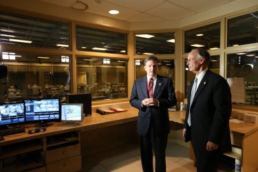 Governor Robert Bentley stops to look at a secure area at Limestone Correctional Facility with Department of Corrections Commissioner Jeff Dunn in Harvest, Ala., Monday, April 4, 2016. Prison guards are able to monitor inmate activities from this room, which overlooks a large inmate dormitory. (Governor's Office, Jamie Martin)