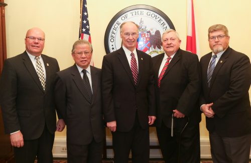 Alabama Governor Robert Bentley poses for a photo with representatives from Golden Dragon Copper and elected officials from Wilcox County as they announce an expansion at Golden Dragon's Wilcox County facility. Wednesday, March 1, 2017. (Governor's Office, Jamie Martin)